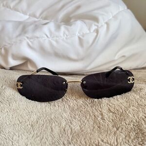 CHANEL Black and Gold Rimless Sunglasses